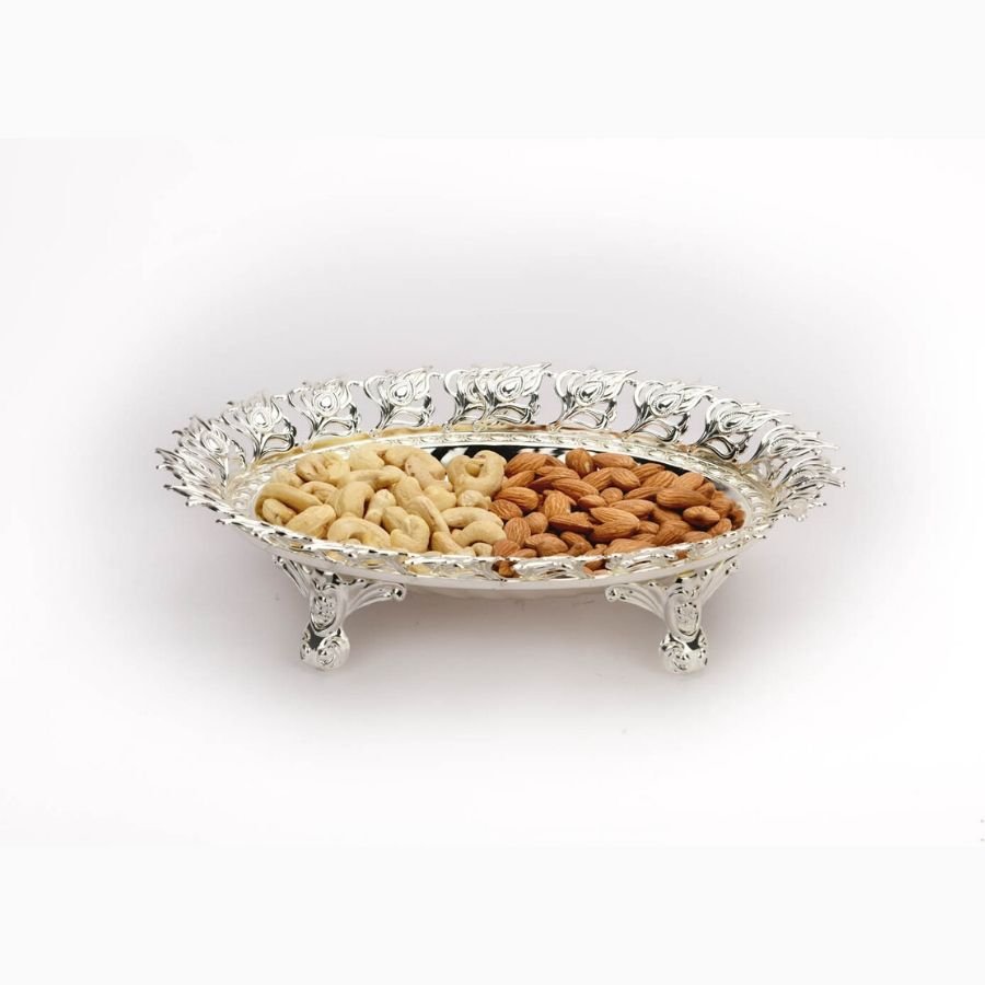 silver tray with dry fruits