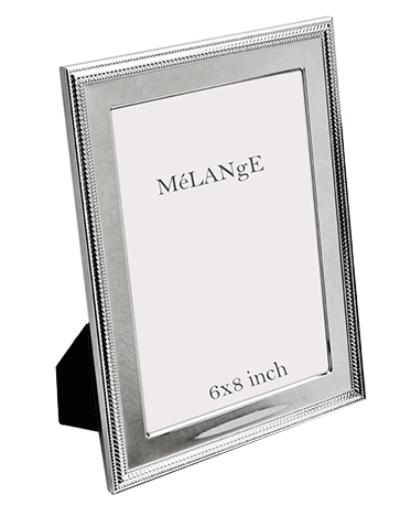 a silver plated photo frame with 6 x 8 inches of photograph requirement