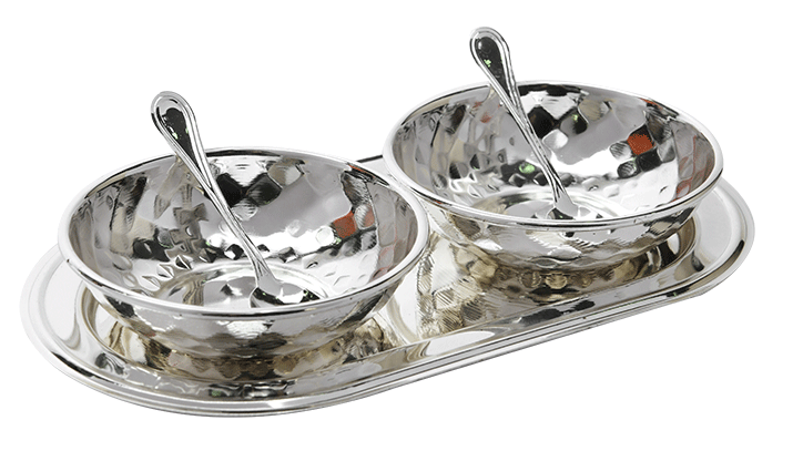 a set of two silver plated bowls with hammered design placed over a silver tray with spoons