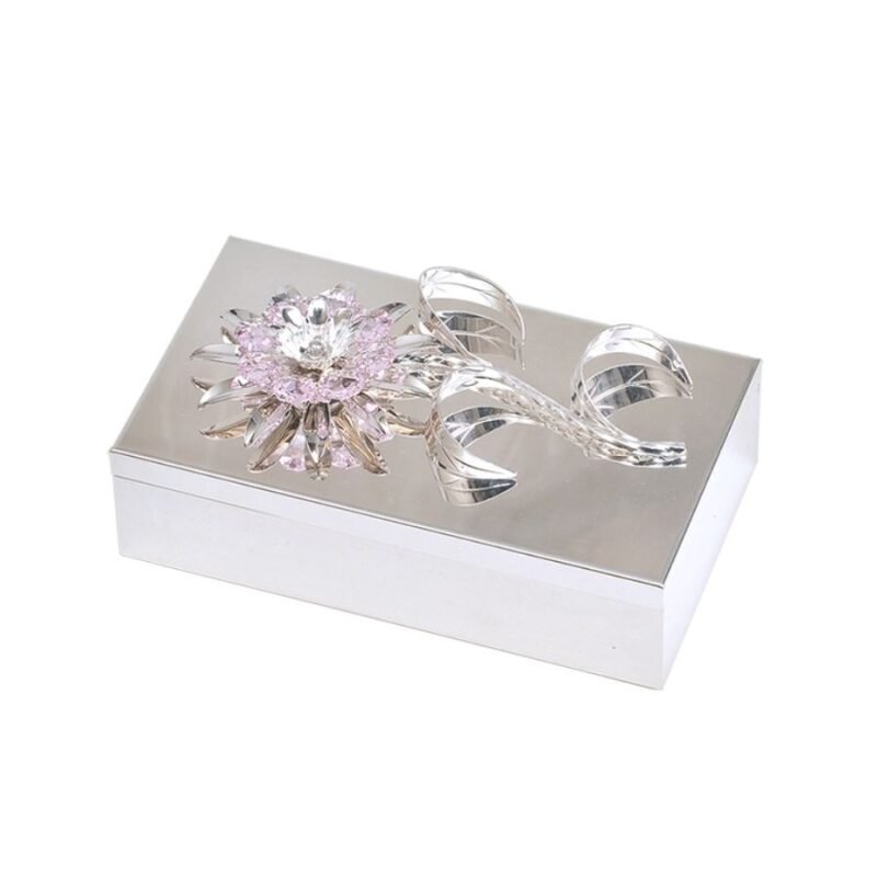 A beautiful silver box with a flower of crystalised petals that looks really magnificent