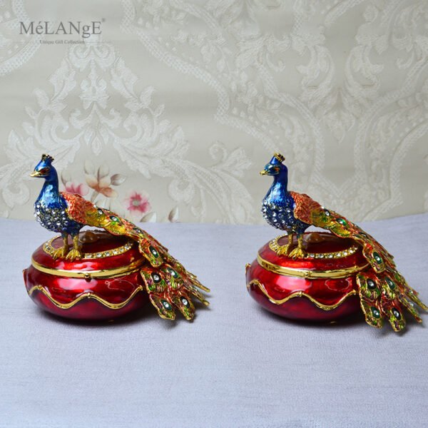 3D Peacock Enameled Jewellery Box (Set of 2) placed on a table